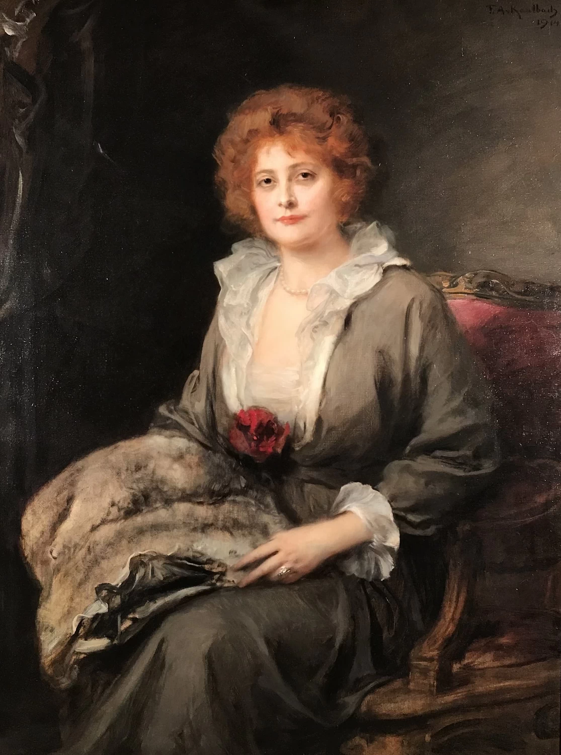 Ritratto di donna seduta in poltrona